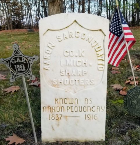 Gravestone Aaron Pequongay at Hillcrest Cemetery in Omena, Michigan.